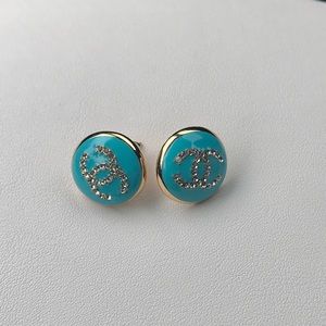 Brand new. Fashion blue & gold earrings